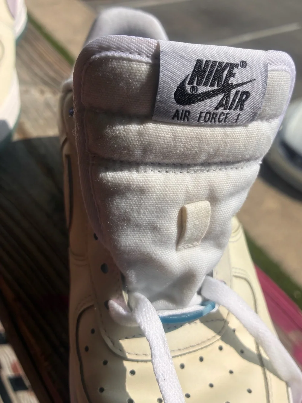 Nike Kids Low-Top Sneakers in Cream with Pastel Pink Swoosh